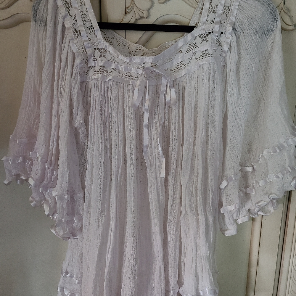 Almost new Gauze top.